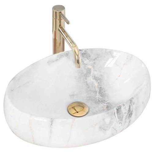 Owalna umywalka przypominająca naturalny kamień i kształt łódki