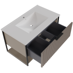 Grafitowe wnętrze szuflady efektownie kontrastujące z bielą umywalki